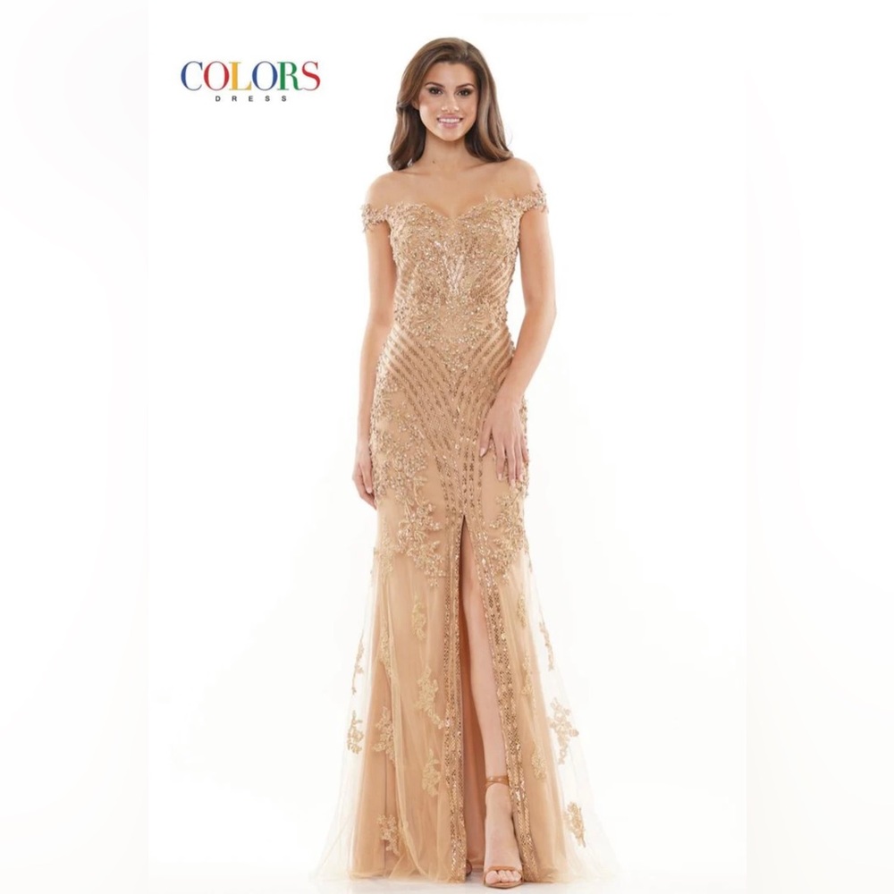 Beautiful gold dress with details of shiny stones.  size 14. only used one night